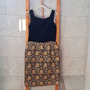 Vintage 1950s Dress with off shoulder, low back with bow.